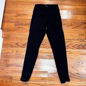 Nice Tommy John Go Anywhere Collection Leggings. Black with blue trim. Size Smal